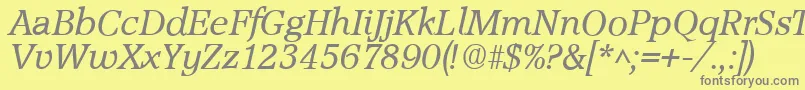 Fonte AccoladeItalic – fontes cinzas em um fundo amarelo
