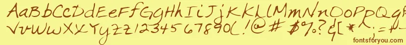 フォントMarkaRegular – 茶色の文字が黄色の背景にあります。