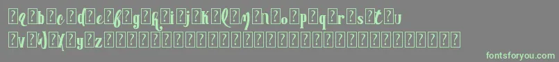 Czcionka AdvertisingmasterDemo – zielone czcionki na szarym tle