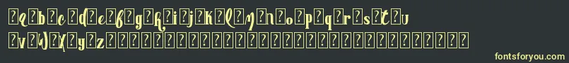 Czcionka AdvertisingmasterDemo – żółte czcionki na czarnym tle