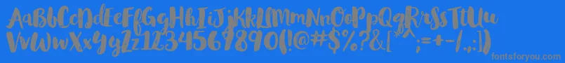 GlamourbrushRegular-Schriftart – Graue Schriften auf blauem Hintergrund