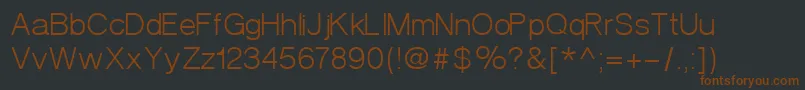 フォントVeronaNormal – 黒い背景に茶色のフォント