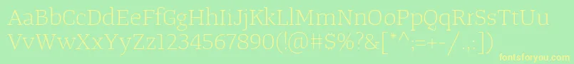フォントTangerserifwideulLight – 黄色の文字が緑の背景にあります