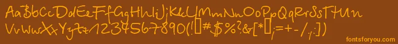 フォントSerikbay.Kz – オレンジ色の文字が茶色の背景にあります。