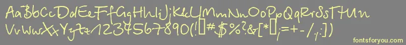 Шрифт Serikbay.Kz – жёлтые шрифты на сером фоне