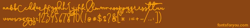 Cestlaisabelly Font – Orange Fonts on Brown Background