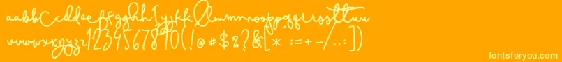 Cestlaisabelly Font – Yellow Fonts on Orange Background