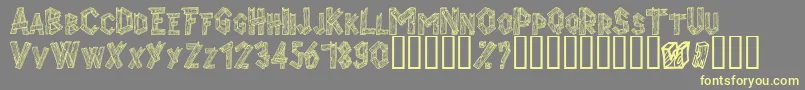 Alphawood-Schriftart – Gelbe Schriften auf grauem Hintergrund
