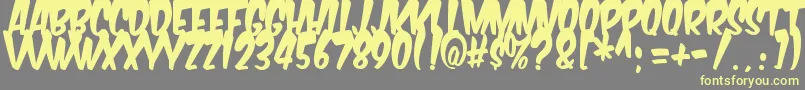 Шрифт KomikaTitleBoogie – жёлтые шрифты на сером фоне