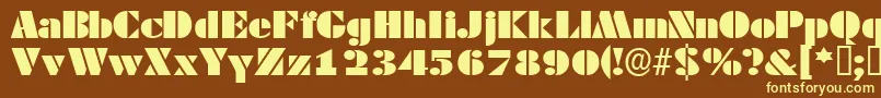 Tessassk-fontti – keltaiset fontit ruskealla taustalla