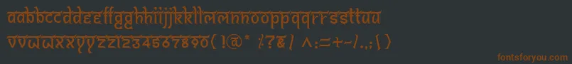 Шрифт BitlingshivomRegular – коричневые шрифты на чёрном фоне