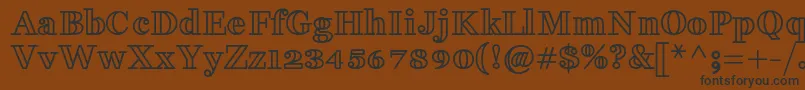 FakedesOutlineBold Font – Black Fonts on Brown Background