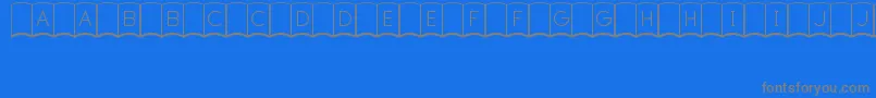 FirstEditionJl Font – Gray Fonts on Blue Background