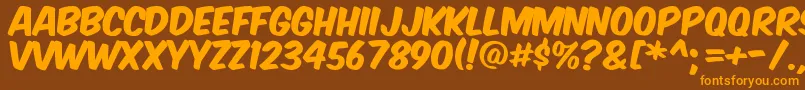 KomikaAxis Font – Orange Fonts on Brown Background