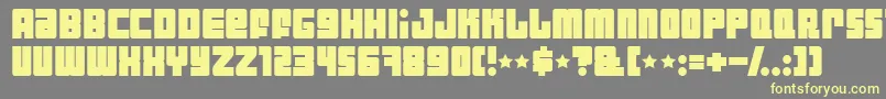 IndustrialDecapitalistBold Font – Yellow Fonts on Gray Background