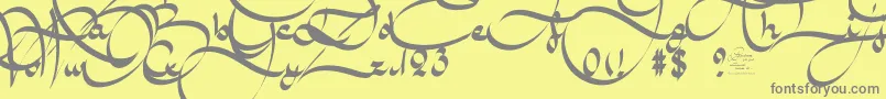 AmalScriptBold-fontti – harmaat kirjasimet keltaisella taustalla