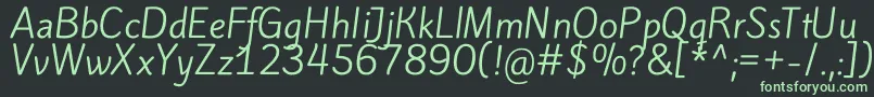KiteoneRegular-Schriftart – Grüne Schriften auf schwarzem Hintergrund