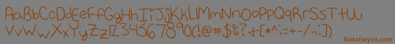 Neko Font – Brown Fonts on Gray Background