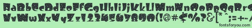 Freckle Font – Black Fonts on Green Background