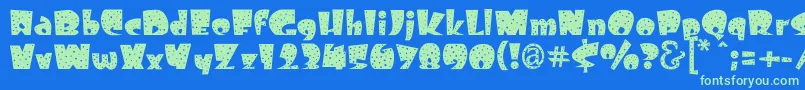 Freckle Font – Green Fonts on Blue Background