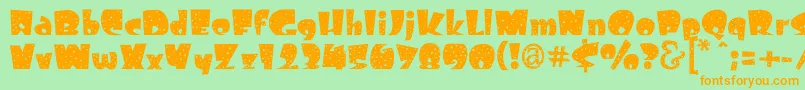 Freckle Font – Orange Fonts on Green Background