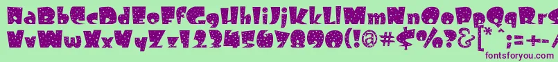 Freckle Font – Purple Fonts on Green Background