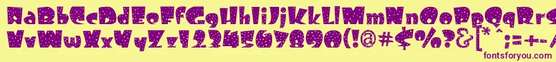 Freckle Font – Purple Fonts on Yellow Background