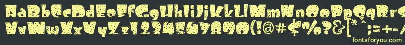 Freckle Font – Yellow Fonts on Black Background