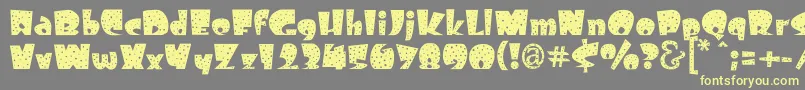 Freckle Font – Yellow Fonts on Gray Background