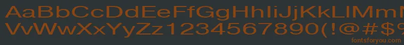 フォントPragmaticactt160n – 黒い背景に茶色のフォント