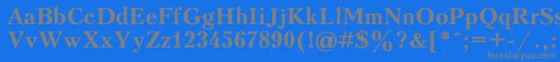 フォントKudrias1 – 青い背景に灰色の文字