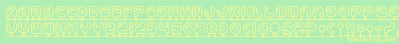 Balloonatic Font – Yellow Fonts on Green Background