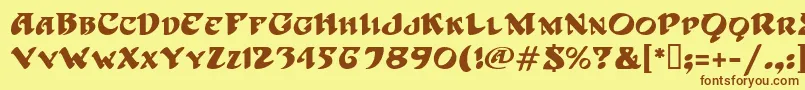 フォントHoffmanMf – 茶色の文字が黄色の背景にあります。