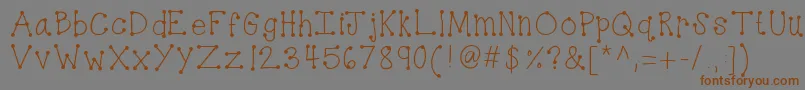 Kbdottydot Font – Brown Fonts on Gray Background