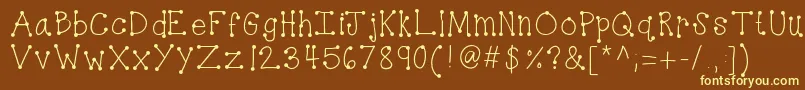 Kbdottydot Font – Yellow Fonts on Brown Background