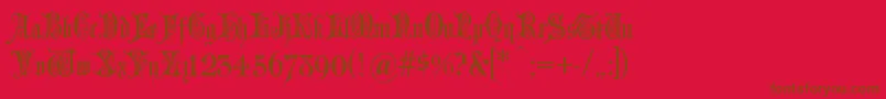 Grusskartengotisch Font – Brown Fonts on Red Background