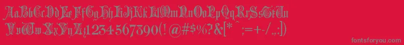 Grusskartengotisch-Schriftart – Graue Schriften auf rotem Hintergrund