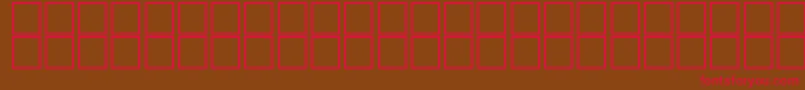 フォントAlKharashi8 – 赤い文字が茶色の背景にあります。