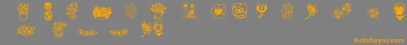 Pansies4sheila2-Schriftart – Orangefarbene Schriften auf grauem Hintergrund