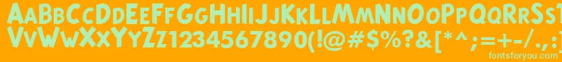 TintinMajusculesBold Font – Green Fonts on Orange Background