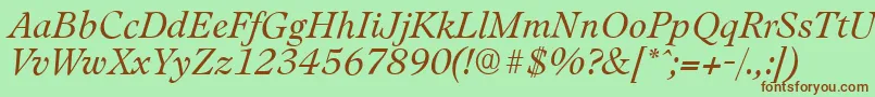 Fonte LeamingtonserialLightItalic – fontes marrons em um fundo verde