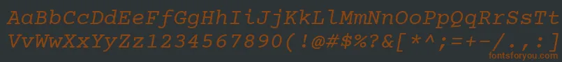 Czcionka CourierPrimeItalic – brązowe czcionki na czarnym tle