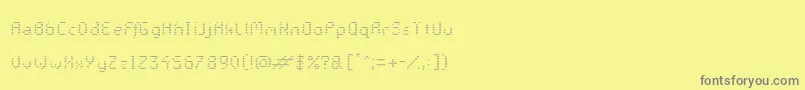 Czcionka GalacticasRegularv.Striped – szare czcionki na żółtym tle