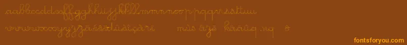 フォントGsOpen – オレンジ色の文字が茶色の背景にあります。