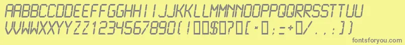 フォントLcdmn – 黄色の背景に灰色の文字