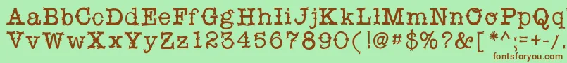 フォントSnobhandscript – 緑の背景に茶色のフォント