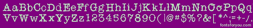 フォントSnobhandscript – 紫の背景に緑のフォント
