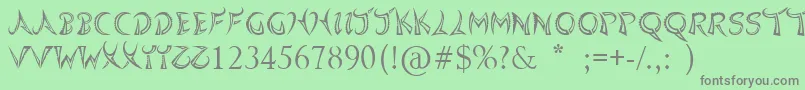 フォントQuasari – 緑の背景に灰色の文字