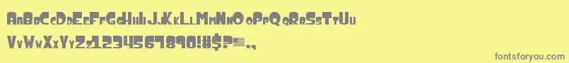 AmericanDad-Schriftart – Graue Schriften auf gelbem Hintergrund