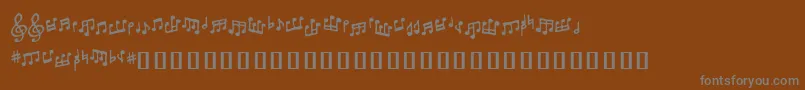 Tonedeafbb-Schriftart – Graue Schriften auf braunem Hintergrund